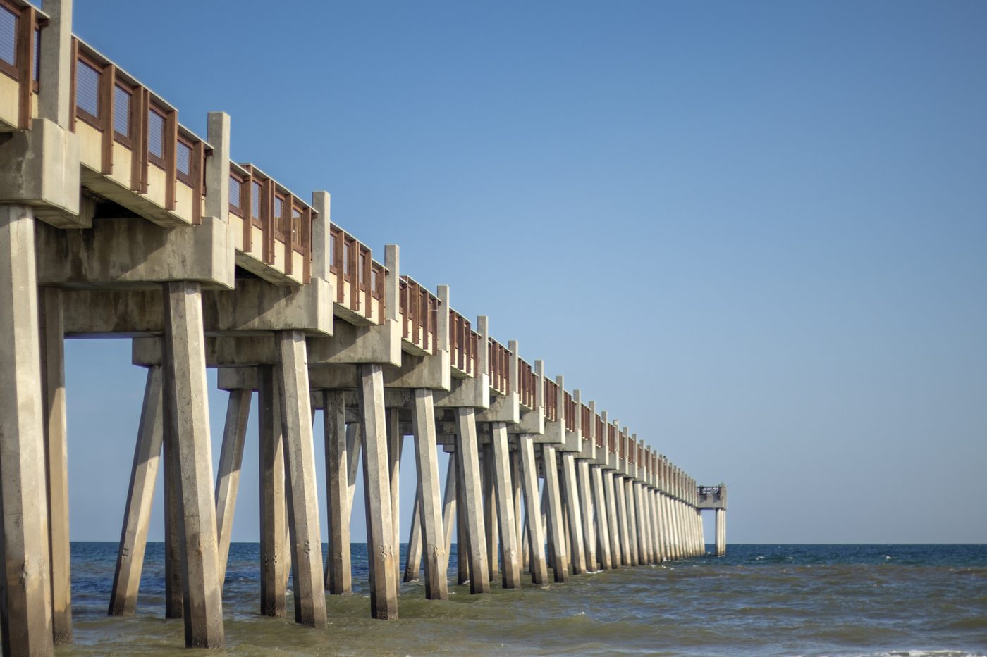 The Pensacola Beach pier receding into the Gulf.