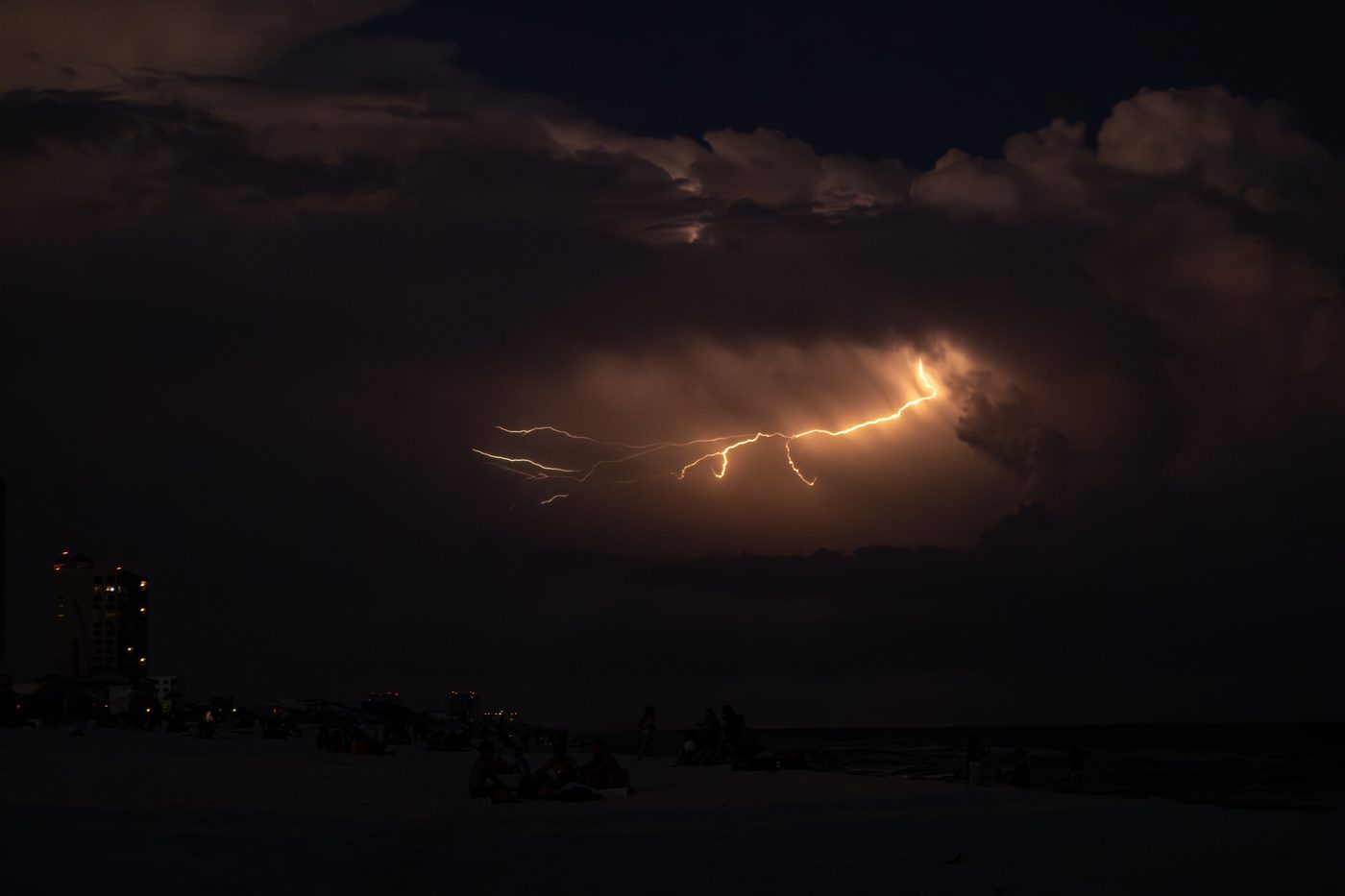 Lightning branching from a storm cell over the Gulf.